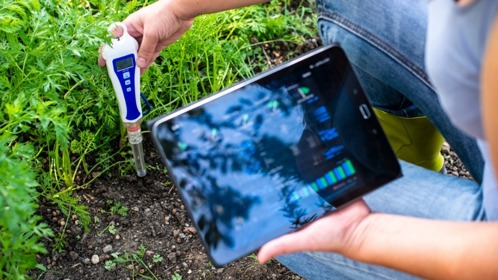 Measure soil with digital device and tablet